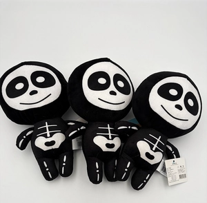 Three cartoon Halloween skeleton plush dolls with white bone patterns on black fabric