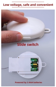 Detail of LED light battery box with toggle switch for three AAA batteries
