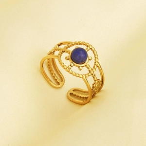 Detail of vintage 304 stainless steel ring with blue lapis lazuli and beaded edges
