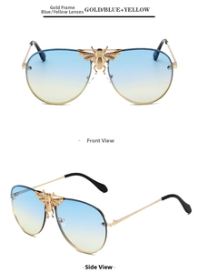 Close-up of gold bee detail on pilot sunglasses with blue and yellow gradient lenses