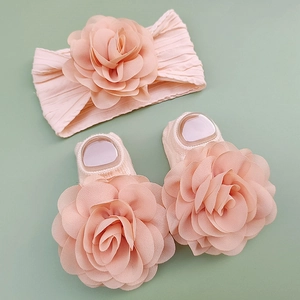 Infant peach chiffon floral headband and anti-slip socks set with ruffled fabric texture