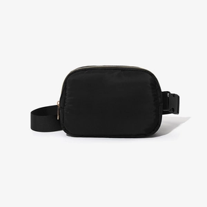 Classic black nylon fanny pack with golden metal zipper and adjustable buckle strap