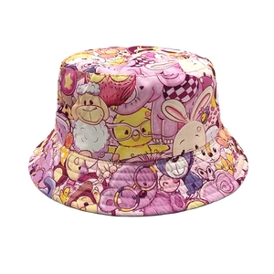 Detail of kids sun hat with colorful cartoon patterns including sheep and owls