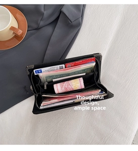 Detailed interior of a large capacity skull wallet with multiple card slots and compartments