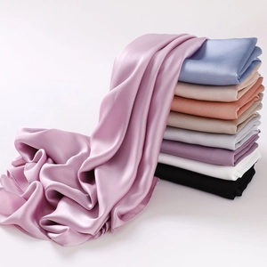 Premium chiffon silk shawls displayed in a variety of colors with a soft drape texture