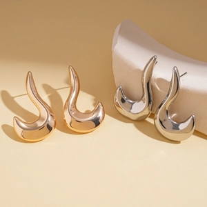 Minimalist metallic geometric curved stud earrings in high-polish gold and silver finish