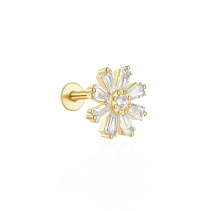 Macro view of gold flower earrings with sparkling cubic zirconia and dangling fringe detail