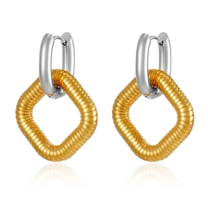 Detailed shot of two-tone stainless steel earrings with textured gold square pendant