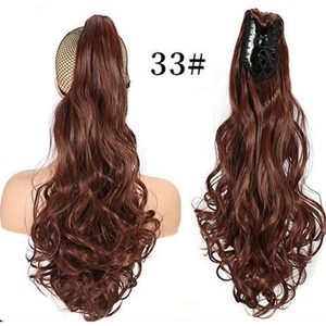 Detail of red brown 33# claw clip ponytail showing wavy synthetic hair texture and inner clip