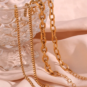 18K gold plated stainless steel box chain and link chain anklets on pink silk