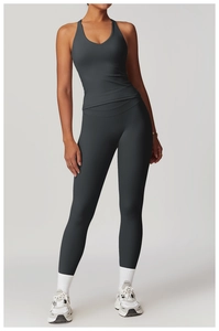 Detailed full view of charcoal grey cross-back yoga vest and high-waist sports leggings set