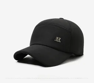 Detail of metal R logo and Sport Best text on a black warm winter baseball cap