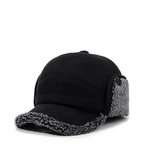 Detail of winter baseball cap with plush ear flaps and warm faux lamb wool lining