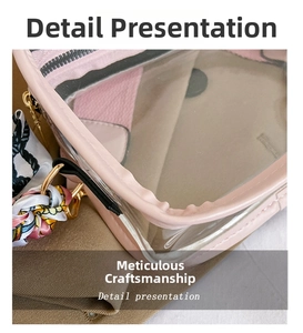 Detail of pink PVC crossbody bag with golden hardware and decorative floral silk scarf