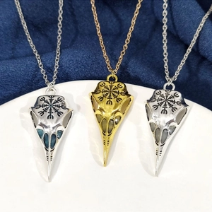Luminous Viking raven skull necklaces with Nordic runes in silver and gold finish
