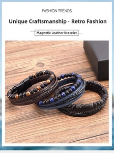 Detail of multi-layer braided leather bracelets with tiger eye stones and magnetic clasps