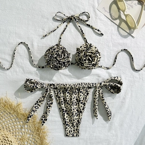 Detail of leopard bikini with 3D rosette flowers and drawstring side-tie bikini bottoms