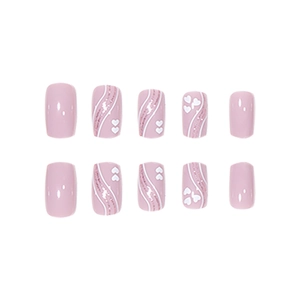 Short square press-on nails in light pink with white swirls, glitter, and heart motifs