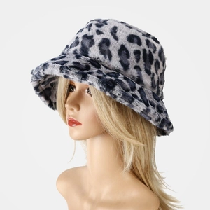 Detailed view of grey leopard print faux fur bucket hat with soft plush texture