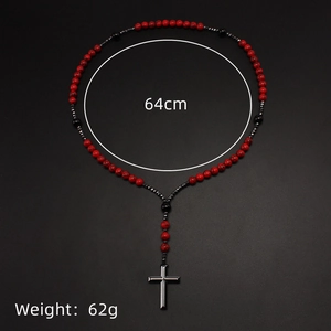 Detail of 8mm red turquoise and black agate prayer beads with a 64cm necklace length