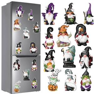 Detailed collection of 12 Halloween gnome magnetic stickers displayed on a silver fridge