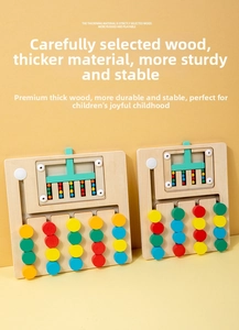 Close-up of wooden color sorting logic puzzle boards with sliding balls for kids