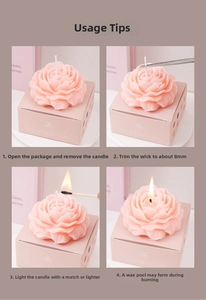 Macro shot of pink peony scented candle in elegant gift box with operation guide