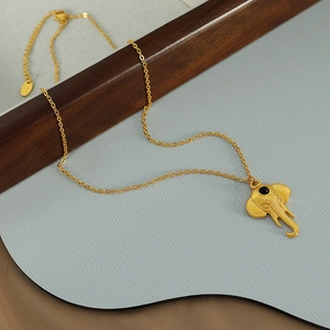 Minimalist gold elephant pendant necklace with retro ethnic style for women and girls
