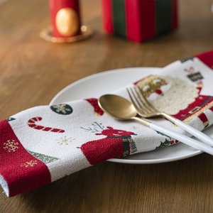 Festive Christmas table mat with Santa Claus and reindeer on a white plate