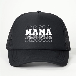 Detail of black trucker hat featuring MAMA text print and breathable mesh back
