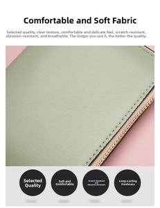 Detail showing high-quality light green litchi texture leather and golden zipper on wallet