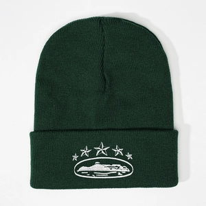 Forest green knitted beanie with white five-star embroidery and a ribbed turn-up cuff