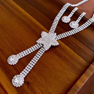 Elegant star pendant necklace and earrings jewelry set with sparkling rhinestones