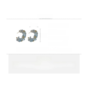 Detail view of C-shaped blue gemstone earrings with dimensions 3.6cm by 3.2cm