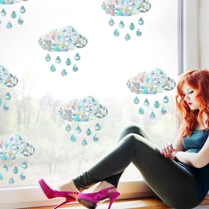 Scene showing rainbow holographic cloud and raindrop window film with prismatic light effect