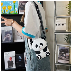 Toddler crossbody bag featuring a 3D panda shape with an adjustable patterned strap