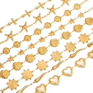 Golden stainless steel ocean theme bracelet with starfish, shell and heart charms