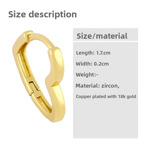 Detailed view of 18K gold plated heart earrings with measurements 1.7cm by 0.2cm