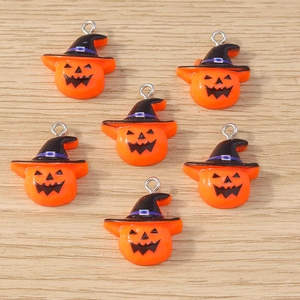Detail of 6 cartoon pumpkin charms with black wizard hats for Halloween jewelry making