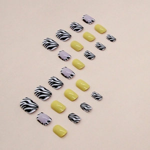 Short square press-on nails set featuring yellow, zebra print, and purple French tips