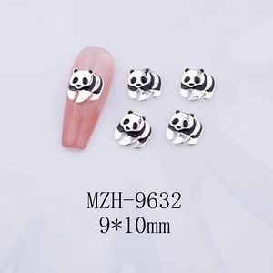 Macro shot of 9x10mm cute panda nail charms in gold alloy for DIY manicure art