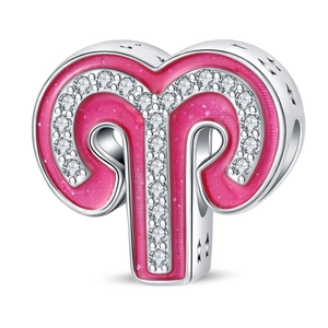 Detailed view of pink enamel Aries constellation charm with sparkling cubic zirconia