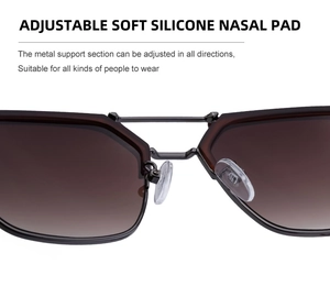 Close-up of adjustable soft silicone nasal pads on stylish metal frame sunglasses