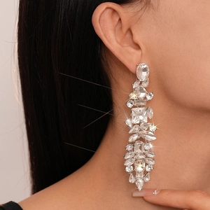 Luxury silver tassel drop earrings with sparkling geometric zirconia for evening wear
