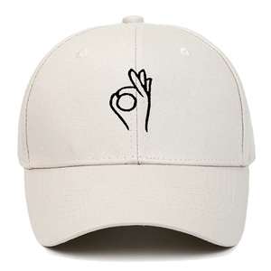 Classic beige cotton baseball cap with embroidered OK gesture on a clean white background