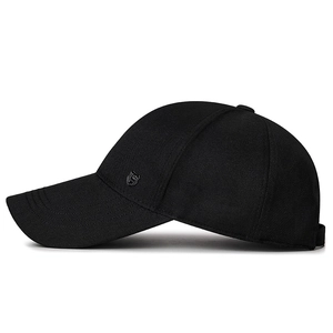 Classic black cotton baseball cap with long visor and metal shield badge detail