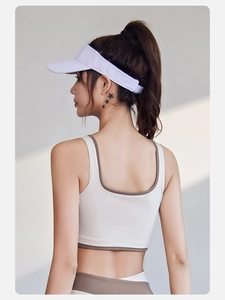 Detail of high-elastic racerback sports bra with stylish contrast trim and seamless fit