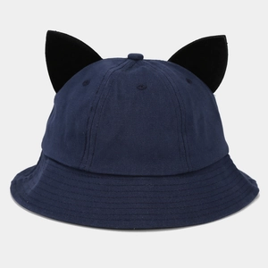 Detail of navy blue cotton bucket hat featuring playful black cartoon devil ears