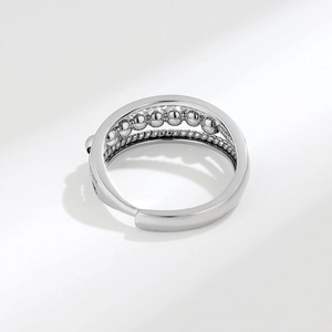 Minimalist S925 sterling silver anxiety ring with beaded texture on white background