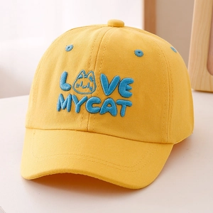 Detail of blue 'LOVE MY CAT' embroidery on yellow cotton children's baseball cap